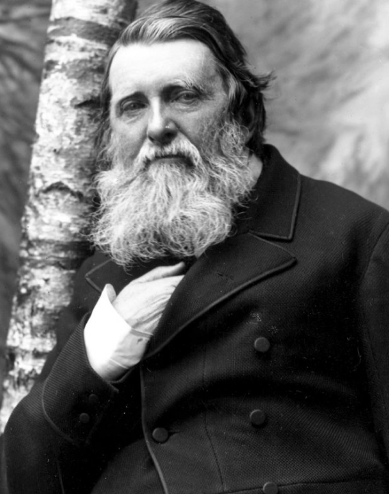 A portrait of John Ruskin.