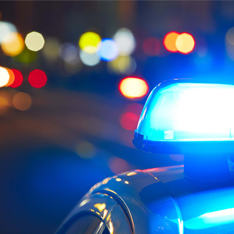 Blue lights on top of a police car.