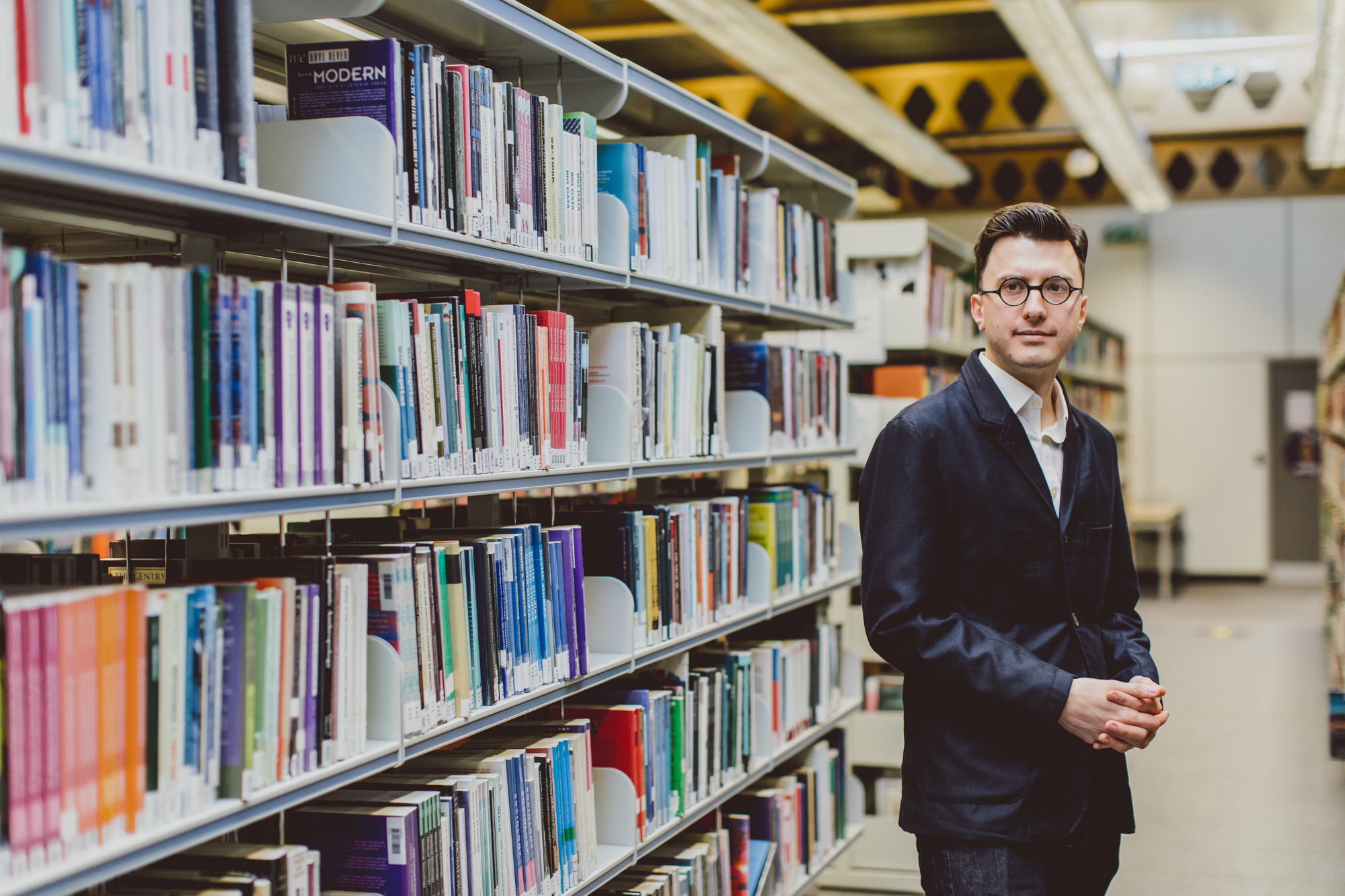 History Lecturer Dr William Tullett in the library