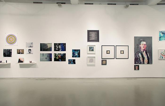 A photo of an art display on a wall.