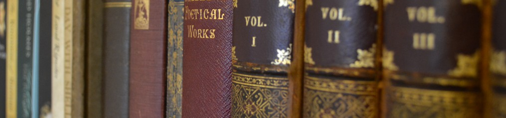 Books pictured on a shelf.