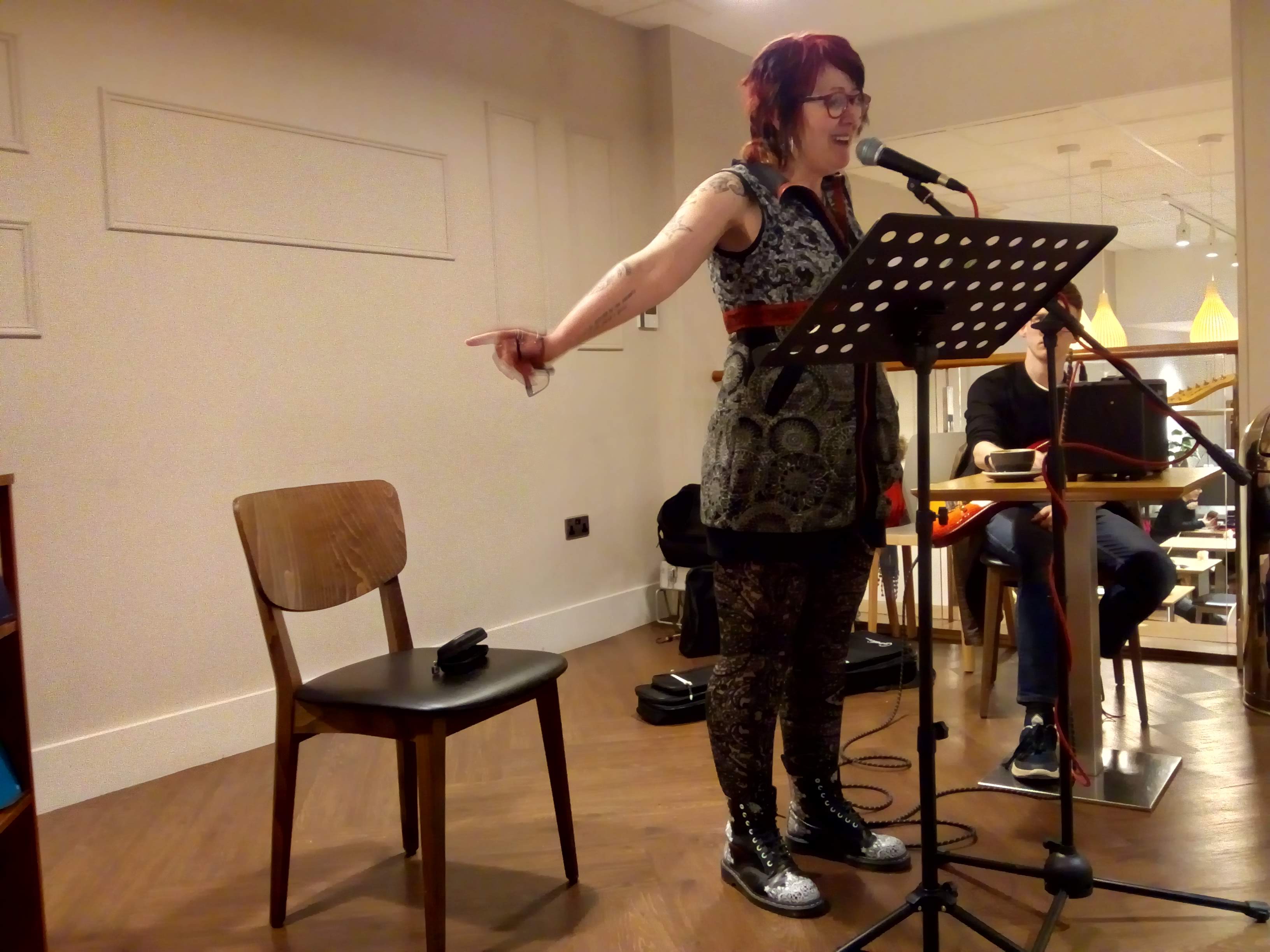 An image of Caron presenting.