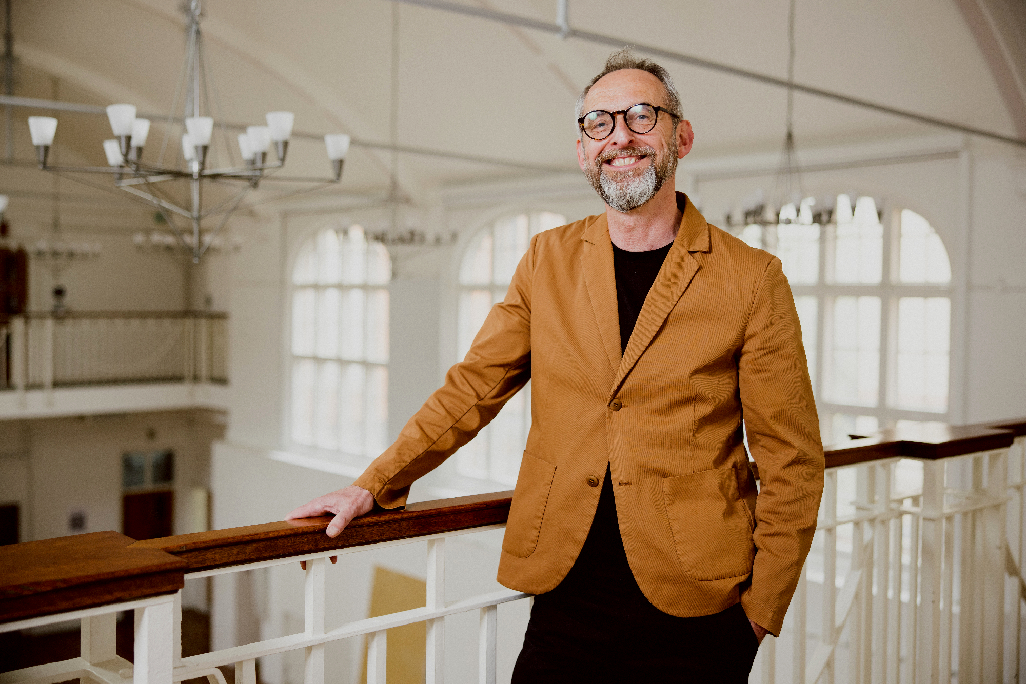 Joe McCullagh standing on Ruskin Gallery Balcony