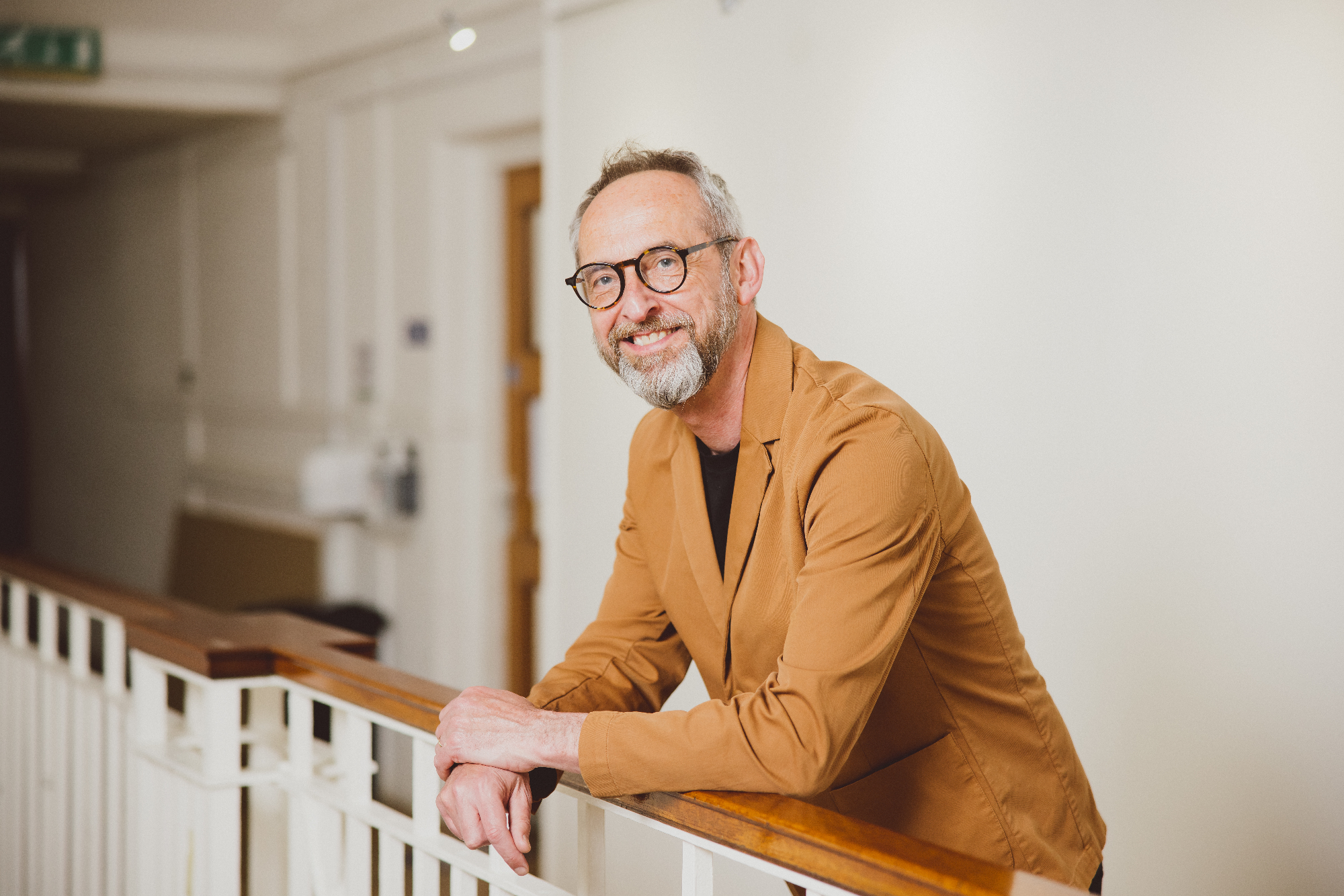 Joe McCullagh leaning on Ruskin Gallery Balcony
