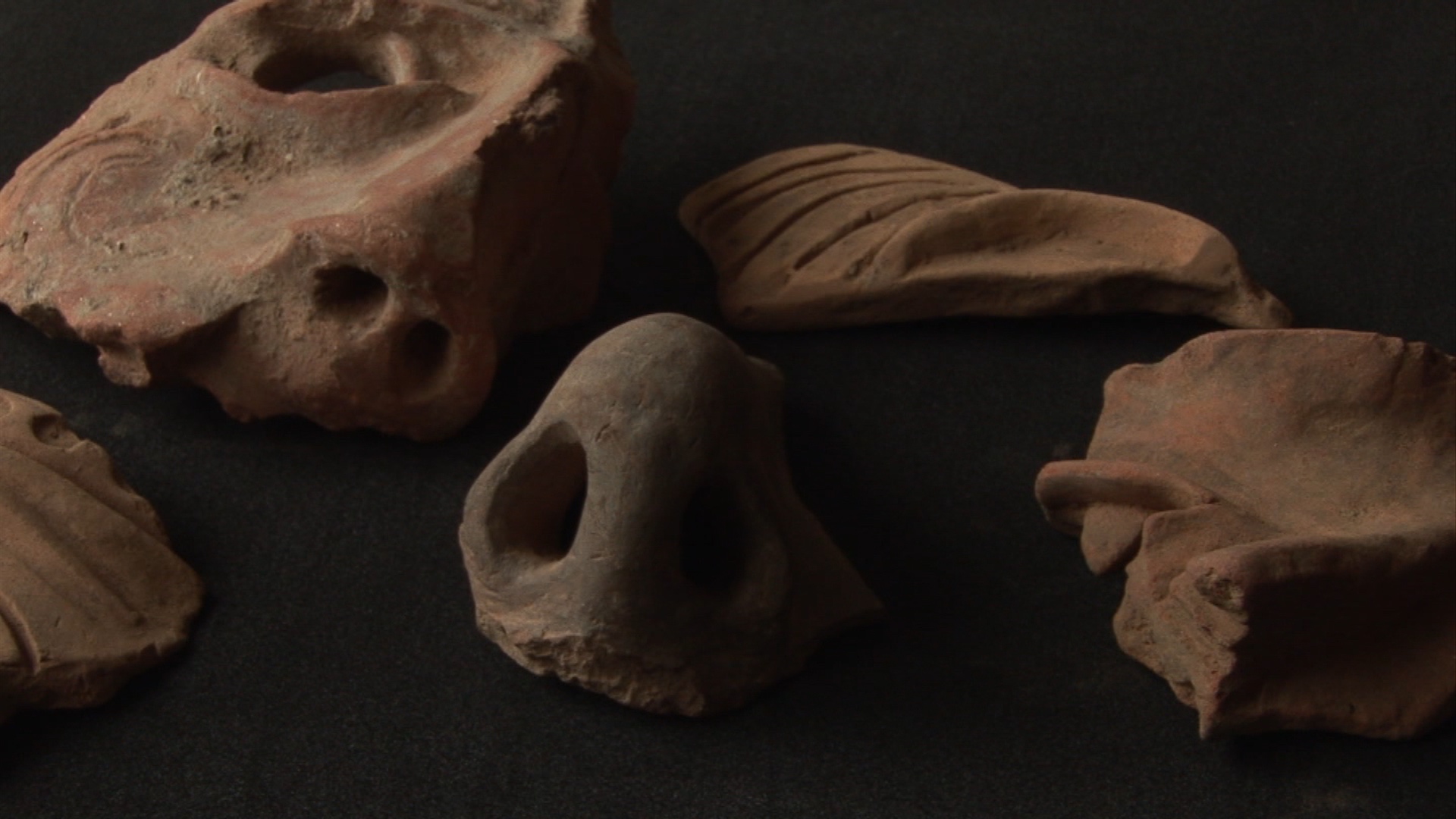 Fragments of stone faces