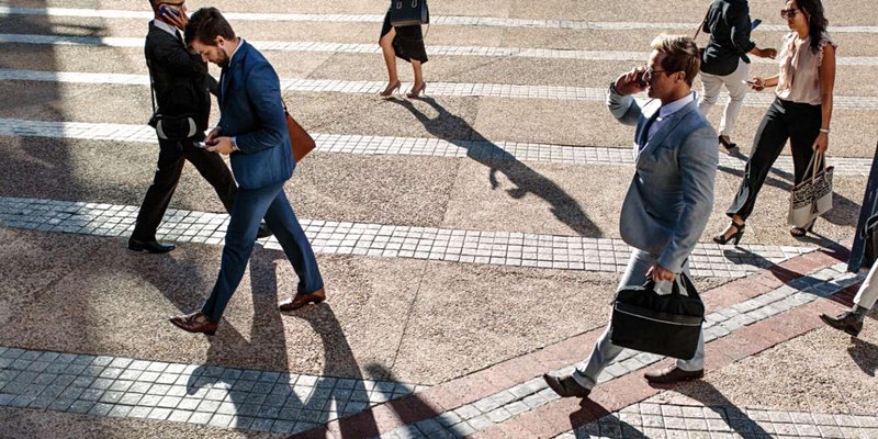 A photo of people crossing a road.
