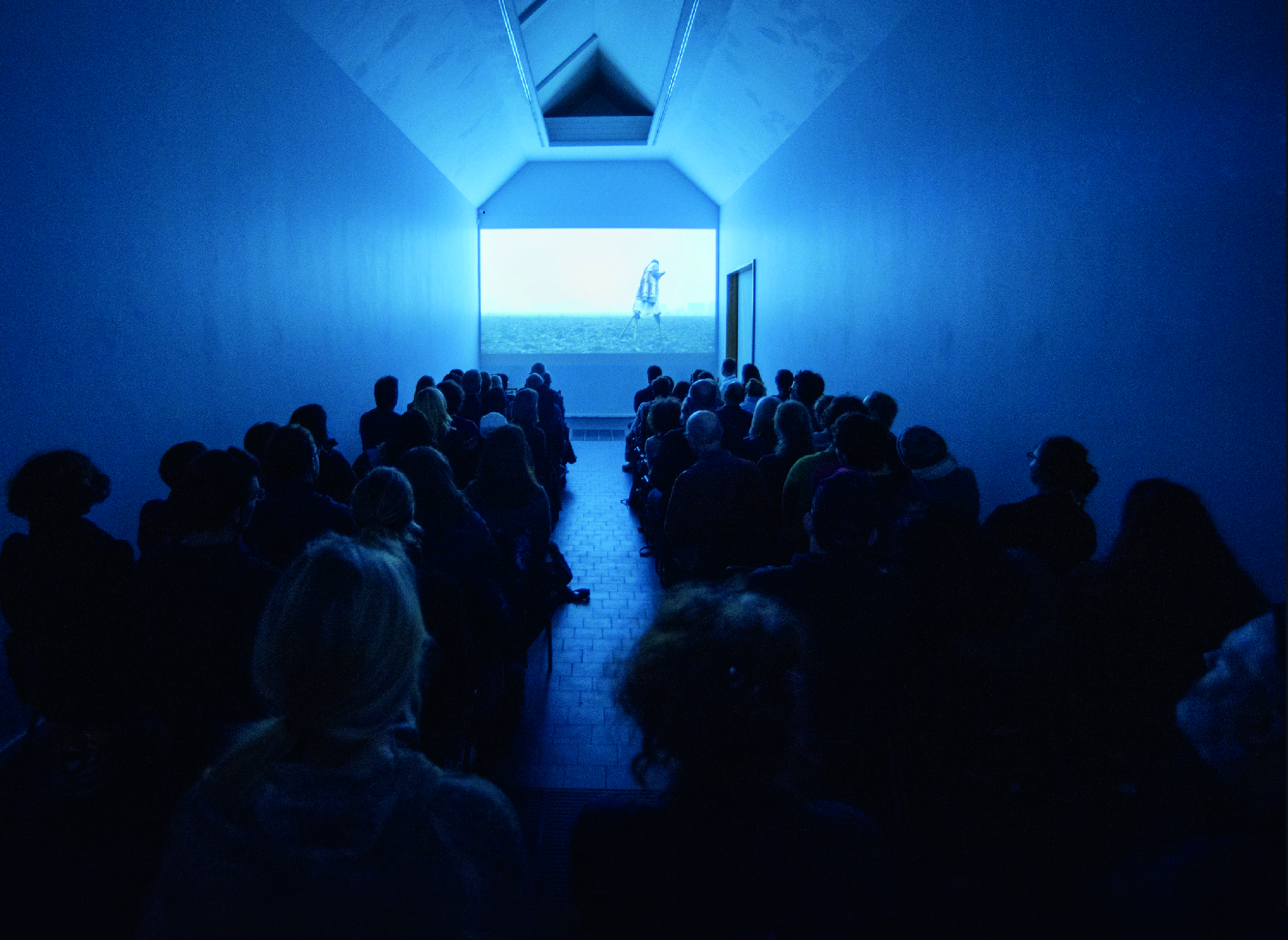 Audience watching a film screening