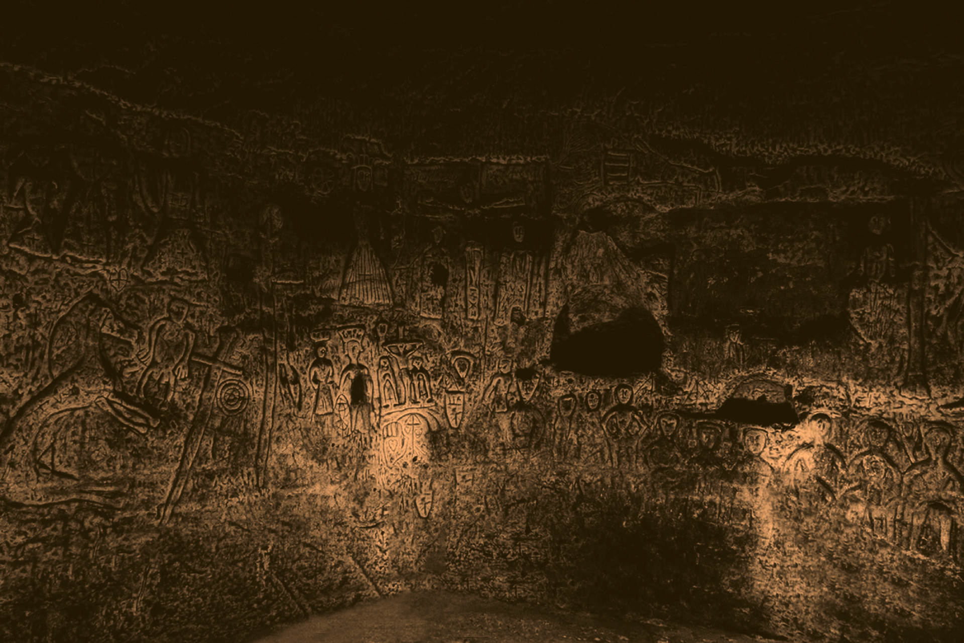 Wall carvings in Royston Cave